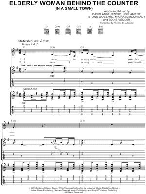 Elderly Woman Behind the Counter In a Small Town