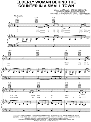 Elderly Woman Behind the Counter In a Small Town