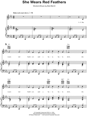 She Wears Red Feathers