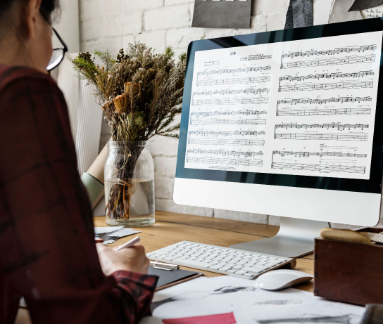 Marketplace Creator composing sheet music